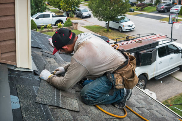 Professional Roof Replacement technician working in Gratiot, OH